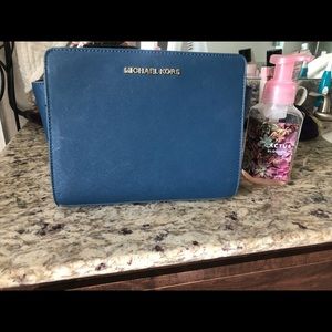 Michael Kors small blue zip up clutch